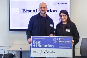 Unbroker CEO and Co-Founder Cory Hogan accepts award as Best AI Solution at Tech Week