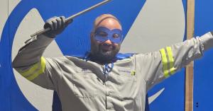 Vortex Doors Minneapolis technician wearing superhero cape and eye mask