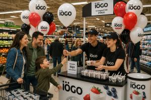 color-coded balloon clusters and structured displays serve as immediate directional markers at grocery stores