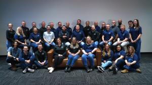 Team members from Jeff Buys Your House pose for a group photo. The veteran-owned, family-operated company serves homeowners throughout the Chicagoland area.