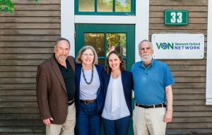 Roger Soll, Erika Edwards, Danielle Ehret, and Jeffrey Horbar outside the VON office.