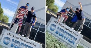 Vortex Doors Centennial technicians wearing superhero capes and eye masks at the Vortex Centennial Service Center