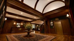 The lobby rendering at The Cliff House evokes a grand mountain manor