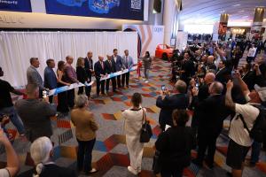 AAPEX ribbon cutting