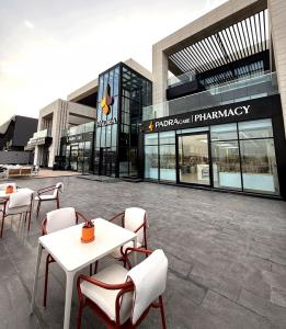 Exterior of a premium hair restoration clinic with private outdoor amenities supporting a discreet patient experience.