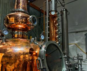 Beautiful copper kettles and distilling equipment at the Three Paths Distillery location.