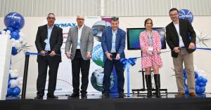 Dymax employees and local Querétaro representatives celebrate the opening of the Mexico distribution center with a ribbon-cutting ceremony.