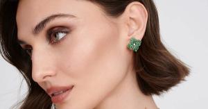 Close-up of Piranesi Fiore Collection green tsavorite flower earrings handcrafted in Italian luxury jewelry with the iconic four-petal floral design.