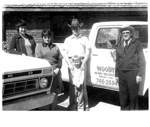 Pictured, left to right: LaVeta Woody; Marge Cockrell, a company secretary; John Woody and his young son (and current owner) Jason Woody; and company founder Milton Woody.