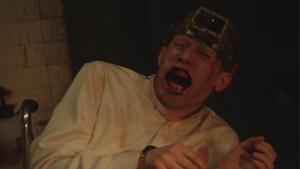 CAPTIVE Director's Cam shot of Kyle with video headband