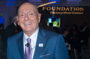 Coach DIck Vitale in a suit at an event for the V Foundation