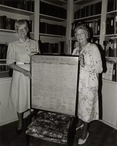Rosemary Frey Rogers ’34 presents then-President Nenah Fry with her copy of the Declaration of Independence in 1984.