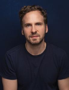 Ryan Spahn portrays Brad Kessler