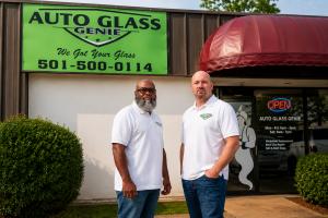 Auto Glass Genie owners outside their Little Rock headquarters.