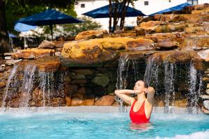 Waterfalls, relaxation areas, poolside restaurants, and bars offer guests endless choices for enjoying this Texas resort.