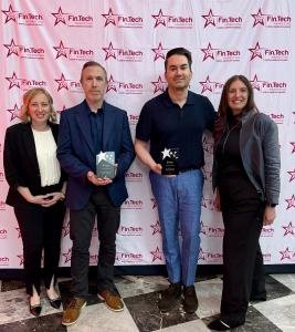 The Energize Marketing team holding two FinTech Marketing North America Awards at the 2026 awards ceremony.