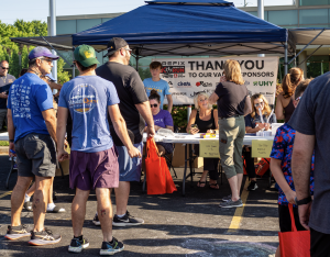 Runners line up to register for the popular PREFIX Corporation 5K.
