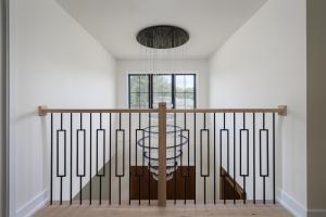 oak railing crystal chandelier