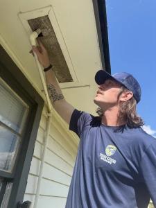 A True Care Wildlife technician identifies a potential wildlife entry point during a home inspection in central Oklahoma. The True Care Home Protection Standard™ encourages understanding how wildlife entered a home before recommending repairs