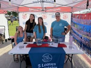 5loaves ministry back wall with step repeat custom logo 10x10 tent by splashtents