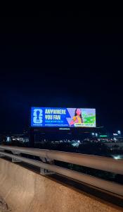 Danni Derr Philadelphia commercial model on FIFA World Cup 2026 billboard at night