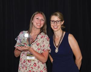 Abby Witt, Senior Paid Advertising Specialist, accepting the award for Nover Marketing