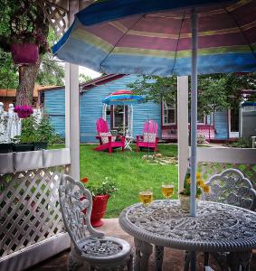 Holden House offers many common spaces to relax including the secluded garden with a gazebo and fountains
