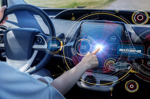 A driver's hand touches a futuristic digital dashboard display in a car, with holographic-style graphics showing security features including a one-time password and access permission codes.
