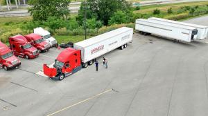 DriveCo Instructors conducting pre-trip inspection training with students.