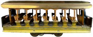 Carlisle & Finch (Cincinnati, Ohio) 2-inch gauge electric toy summer trolley. German composition policeman figures were added to the ends of the 14½-inch-long trolley. Sold for $40,800