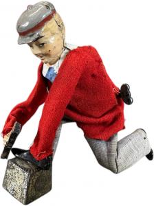 Fernand Martin (France) wind-up shoe shiner – “Le Petit Decrotteur” – manufactured circa 1898, 5 inches tall with the original clothing and fabulous face paint. Sold for $6,600
