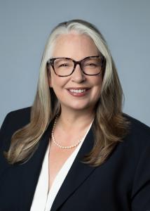 Professional headshot of Liz Klingensmith, litigation partner at Burke Law Group in Houston.