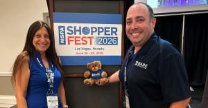 BARE International representatives Marguerite Turner and Jason Bare at MSPA Americas ShopperFest 2026 in Las Vegas with the BARE Bear mascot after receiving the 2026 Shoppers' Choice Award.