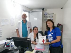 SAID NGO in Lebanon, presents a colorectal cancer screening kit.