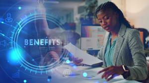 Business owner reviews an invoice factoring agreement while evaluating financing options for growth.