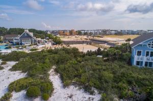 Early construction of Grace Point along Scenic Highway 30A, showing the community beginning to take shape.