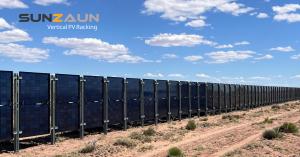 Miles of Sunzaun vertical bifacial solar fencing installed along a property perimeter, generating solar power while doubling as a fence line