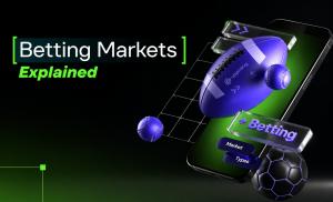 3D illustration of a smartphone displaying sportsbook betting markets with sports balls, floating betting interface elements, and the title "Betting Markets Explained" on a black and green background.