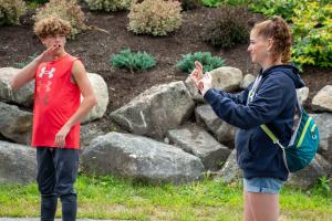Jayson and his mother Liz Seal together at Pine Tree Camp's specialized overnight camp for Deaf and Hard-of-Hearing youth in Rome, Maine.