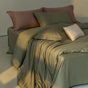 RUHO Living sage green Egyptian cotton duvet cover set with matching pillowcases on a styled bed