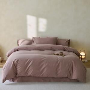 RUHO Living mauve long-staple cotton duvet cover set with shams in a minimalist bedroom