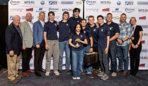 Students and MATE ROV Competition Officials celebrating Triton Robotics' second place finish in a category featuring 40 of the best high school underwater robotics teams in the world.