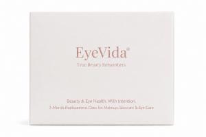 White EyeVida product package with rose-gold lettering reading "EyeVida — True Beauty Remembers" and "3-Month Replacement Cues for Makeup, Skincare & Eye Care."
