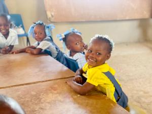 Young students have electricity at their school for the first time, giving them a 21st Century Education.