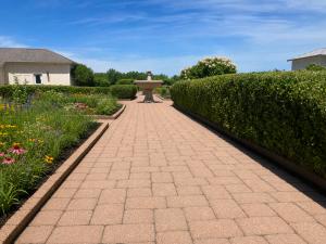 Shire Lane Guest House is surrounded by private gardens, winding walkways, patios, and mature landscaping. Enjoy a peaceful estate setting just steps from New Town's lakes, parks, restaurants, and amenities.