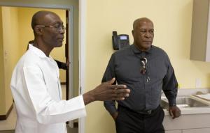 John Amos with Dr. Kwadwo Gyarteng-Dakwa, who was bringing a medical program vision for Ghana