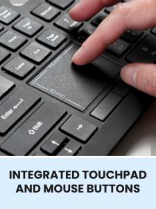 Close-up of a finger using the integrated touchpad on the black PERIBOARD-513 III keyboard, showing the 54 mm by 40 mm touchpad area and physical mouse buttons.