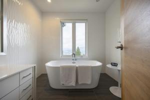 Homeowners reviewing renovation plans and scope of work with a contractor in Metro Vancouver.