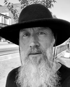 Portrait of author Jesse Kuhn, creator of the Always Here Grief Companion Series and Certified Grief Educator.