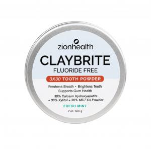 Top view of Zion Health CLAYBRITE® 3 X 30 Fluoride-Free Tooth Powder in Fresh Mint, packaged in a round aluminum container.